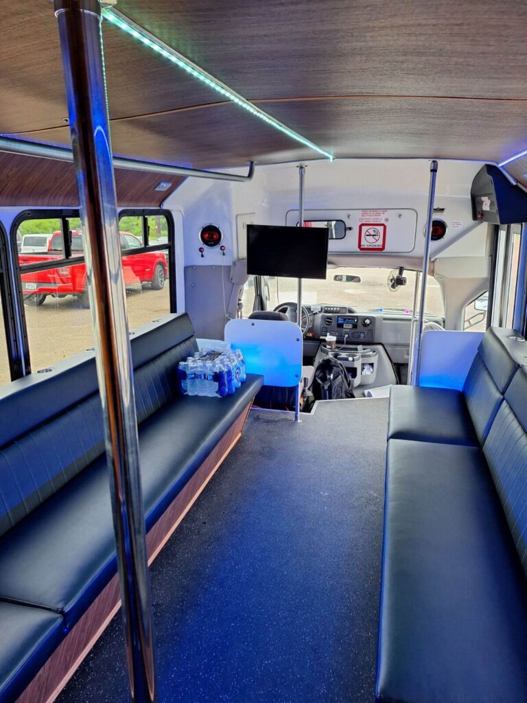 Perfect for a Bachelor Party, this bus features black seats, a TV, drinks, and LED party lighting.